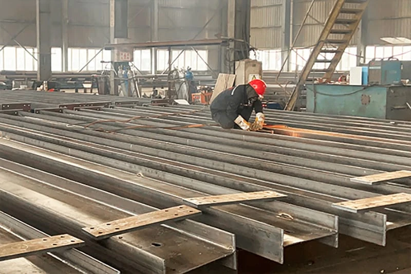 Comparison Between Welded and Hot-Rolled H-Beams in Structural Applications Comparison Between Welded and Hot-Rolled H-Beams in Structural Applications